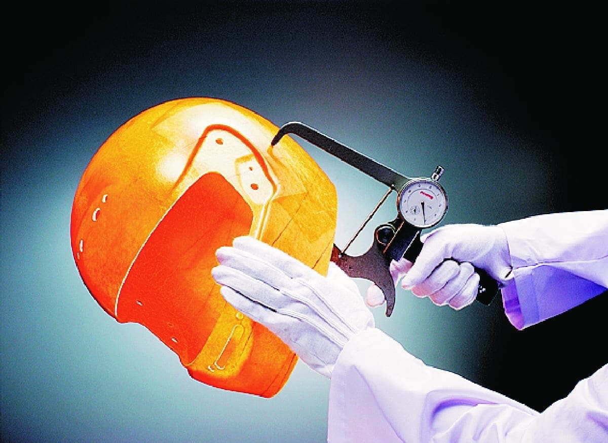 Each helmet's outer shell is measured at this stage for thickness and rejected or passed as necessary. As well as testing helmets to meet certain standards, Shoei also randomly pick finished lids from the production run for their own quality control standards.